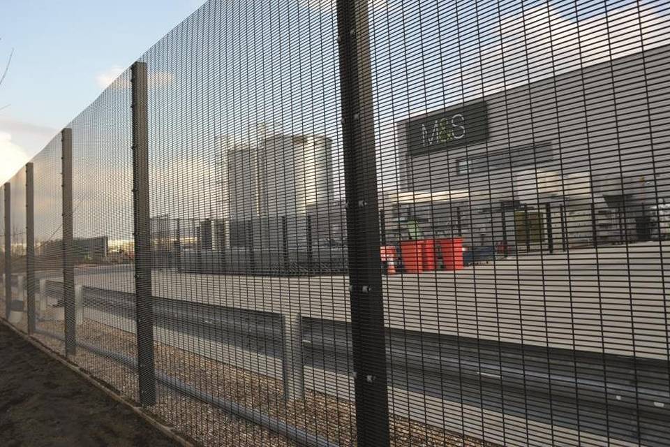 358 security fence is placed along the building and industrial facilities.