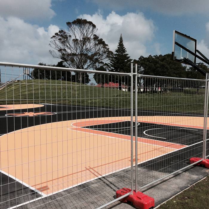 Australia temporary fence is used to create boundaries for basketball court.
