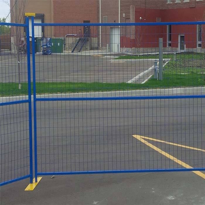 Blue Canada temporary fence is installed outside the building.