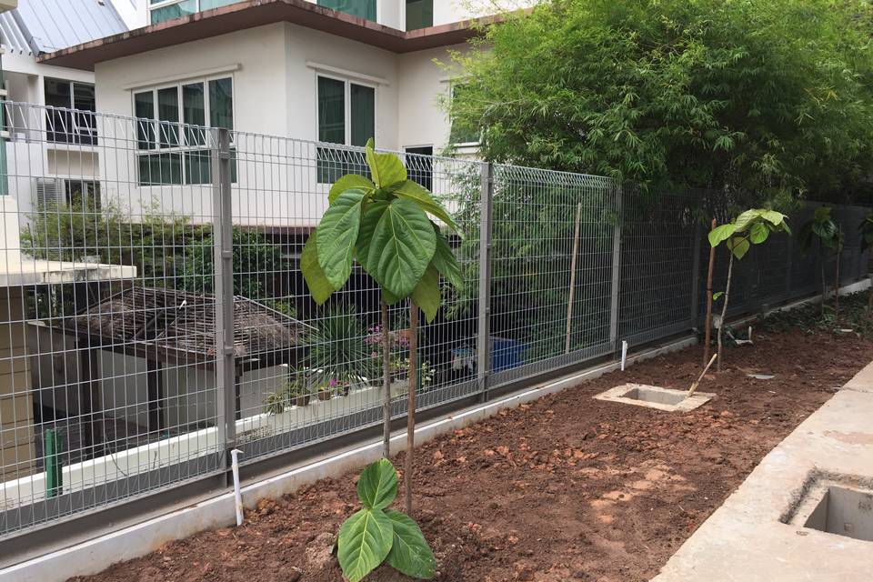 BRC fence is erected on the concrete foundation and set along the residential community.