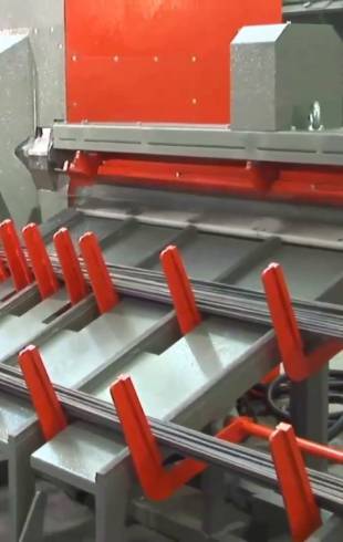 A cutting machine is straightening and cutting steel wires
